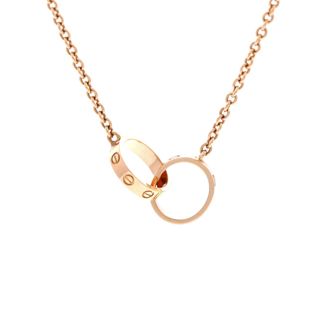 Cartier Love Interlocking Necklace 18K Rose Gold: Layered to wear, the Cartier Love Interlocking Necklace sits exactly where a thoughtful piece is meant to land. Worked in 18K Rose Gold. Scale-wise it lives in the sweet spot between everyday wearabil