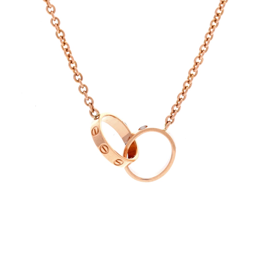 Cartier Love Interlocking Necklace 18K Rose Gold: Built for the collarbone, the Cartier Love Interlocking Necklace translates a house signature into a wearable line. Worked in 18K Rose Gold. The chain length reads as classic mid-collar, where a piece