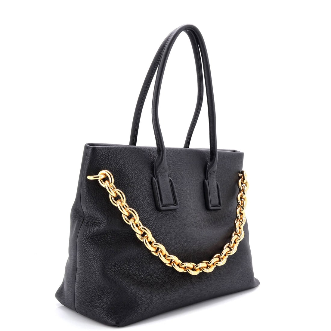 Bottega Veneta Mount Tote Leather: The Bottega Veneta Mount Tote sits within a long line of house silhouettes, the shape refined over successive seasons into the language of the line. A luminous black palette carries the read, sized to