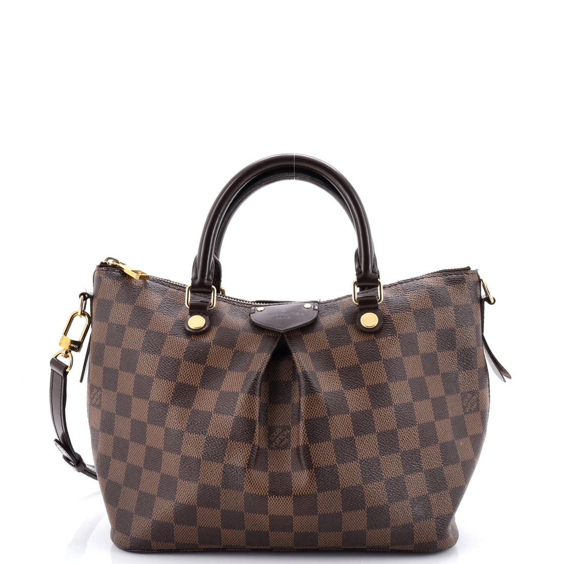 Louis Vuitton Siena Handbag Damier PM: Siena Handbag in damier sits squarely within the Louis Vuitton canon, the structural language unmistakable on sight. In brown, the silhouette reads modern without effort, rendered in Damier, Vuitton's