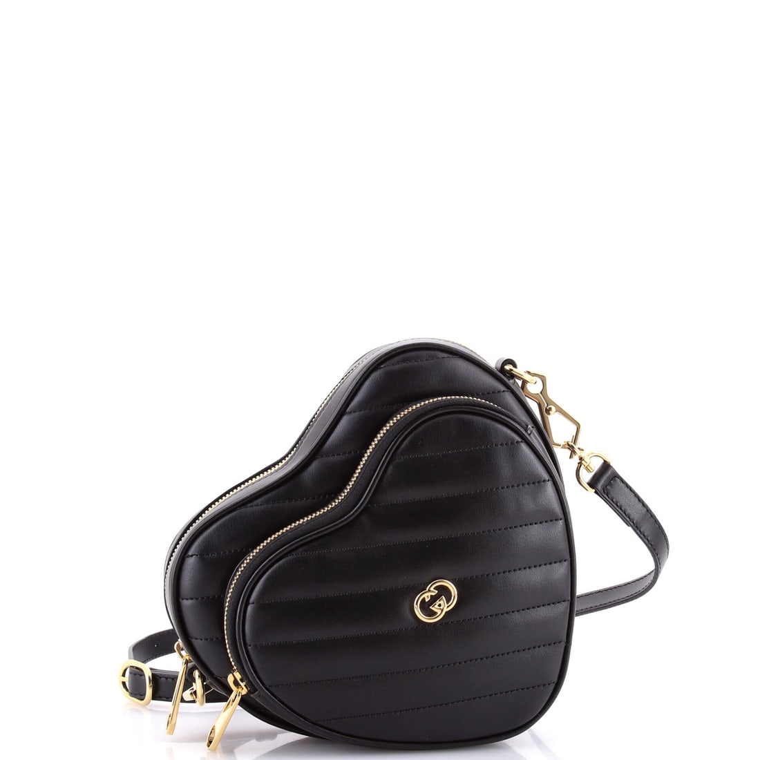 Gucci Interlocking G Heart Shoulder Bag Diagonal Quilted Leather Mini: Sling the Gucci Interlocking G Heart Shoulder Bag and it falls into the right spot at the hip, the strap sized to the wearer's natural reach. A luminous black palette carries the read, holding the