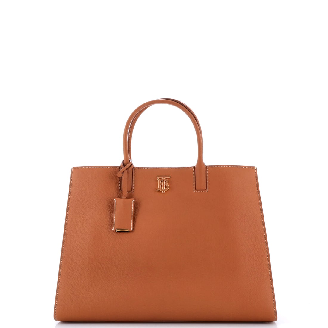 Burberry Frances Tote Leather Medium: The Burberry Frances Tote sits within a long line of house silhouettes, the shape refined over successive seasons into the language of the line. A luminous brown palette carries the read, sized to car