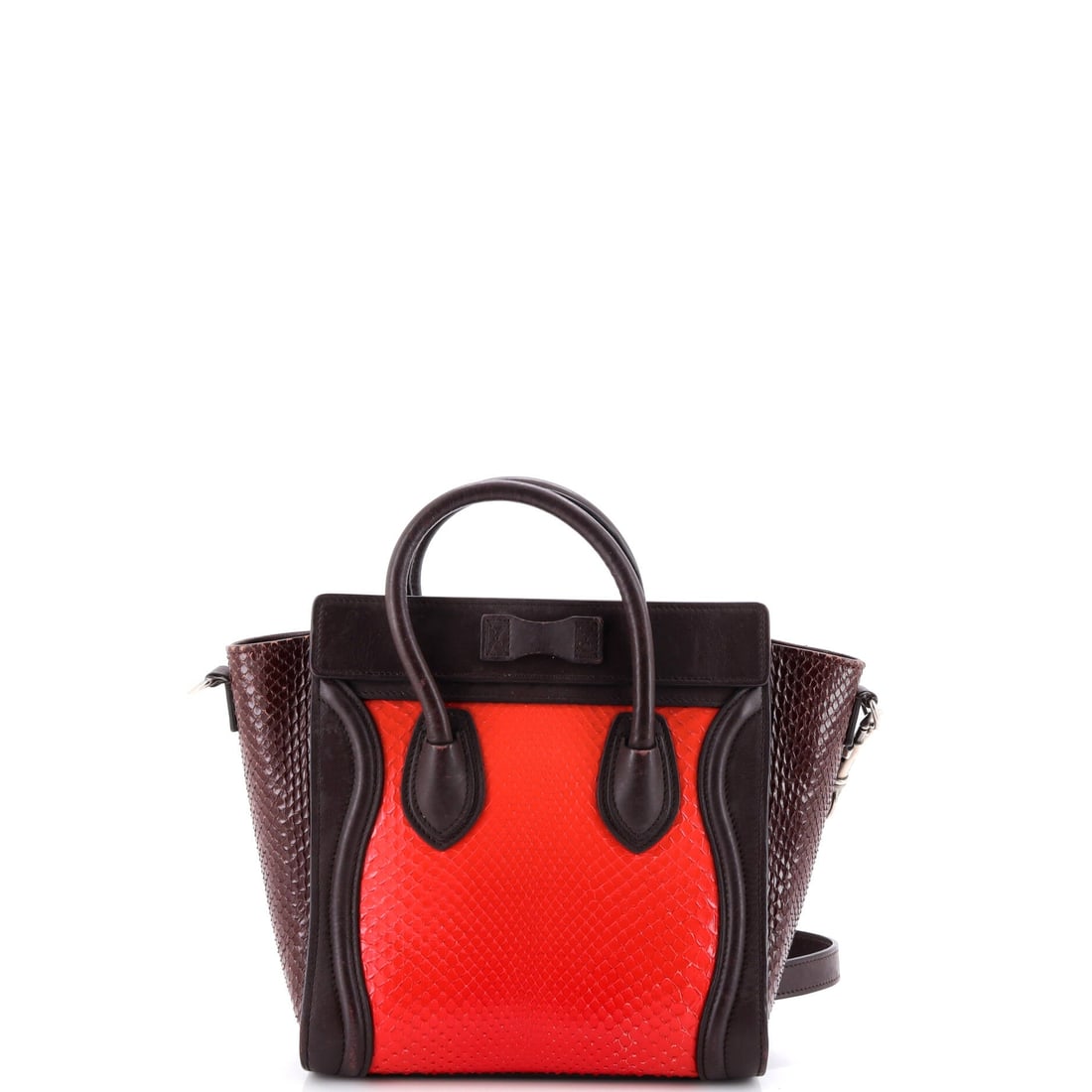 Celine Tricolor Luggage Bag Python and Leather Nano: Tricolor Luggage Bag in python and leather sits squarely within the Celine canon, the structural language unmistakable on sight. A luminous multicolor, red palette carries the read, rendered in python