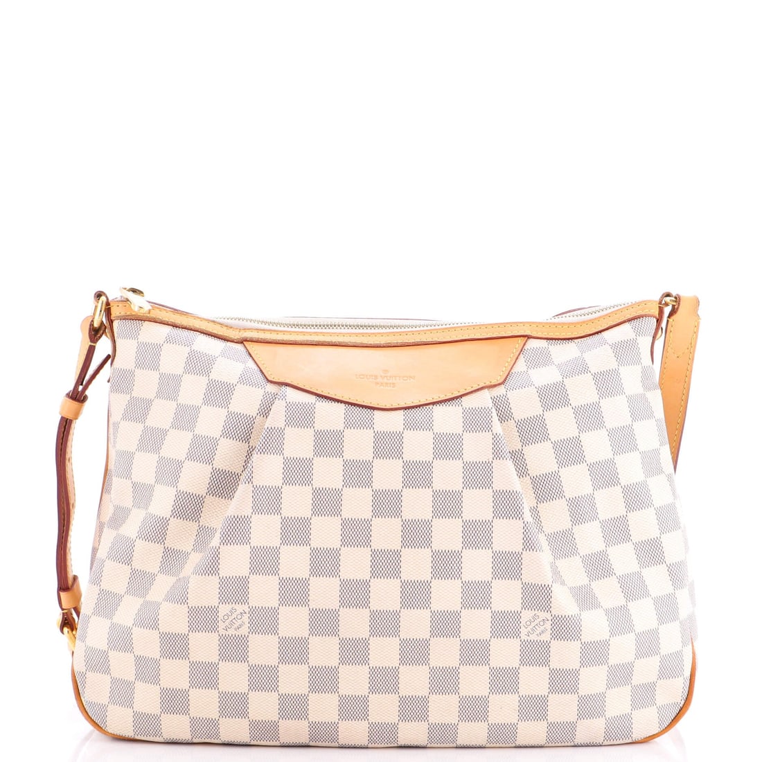 Louis Vuitton Siracusa Handbag Damier MM: The Louis Vuitton Siracusa Handbag earns its weight when carried, the kind of bag that disappears into the silhouette rather than fighting it. The white colorway sits richly across the surface,