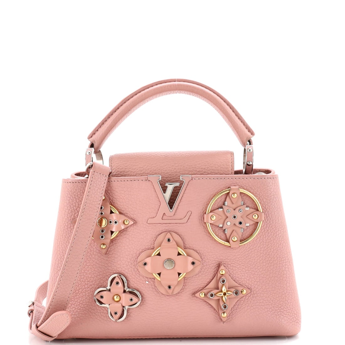Gucci Convertible Duffle Bag GG Shadow Coated Canvas Small: Gucci's Convertible Duffle Bag reads deliberate from every angle, the silhouette in gg shadow coated canvas sketched with the architectural restraint the house is known for. In brown, the silhouette r