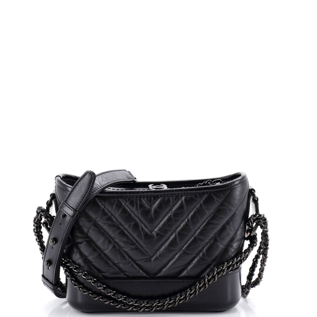 Bottega Veneta Cassette Chain Crossbody Bag Padded Maxi Intrecciato Leather: The Bottega Veneta Cassette Chain Crossbody Bag earns its weight when carried, the kind of bag that disappears into the silhouette rather than fighting it. The green colorway sits richly across the su