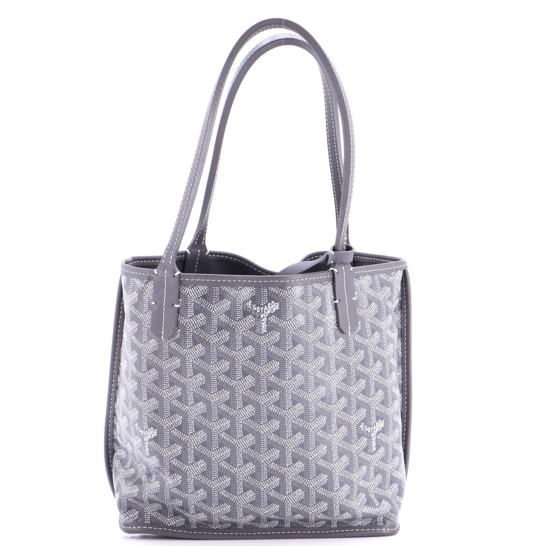 Louis Vuitton Montaigne Handbag Monogram Empreinte Leather MM: The Montaigne Handbag family is one of Louis Vuitton's most quietly continuous, this iteration arriving with the line's hard-won vocabulary intact. In red, the silhouette reads modern without effort, 