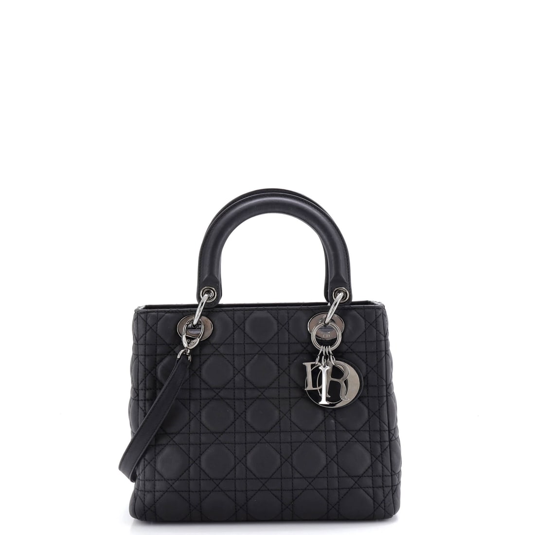 Celine Roller Messenger Bag Triomphe Coated Canvas Medium: Celine's Roller Messenger Bag writes compartmentalization into its design brief, the kind of practical reasoning the house has refined across multiple iterations. Cast in a saturated black, brown, dra