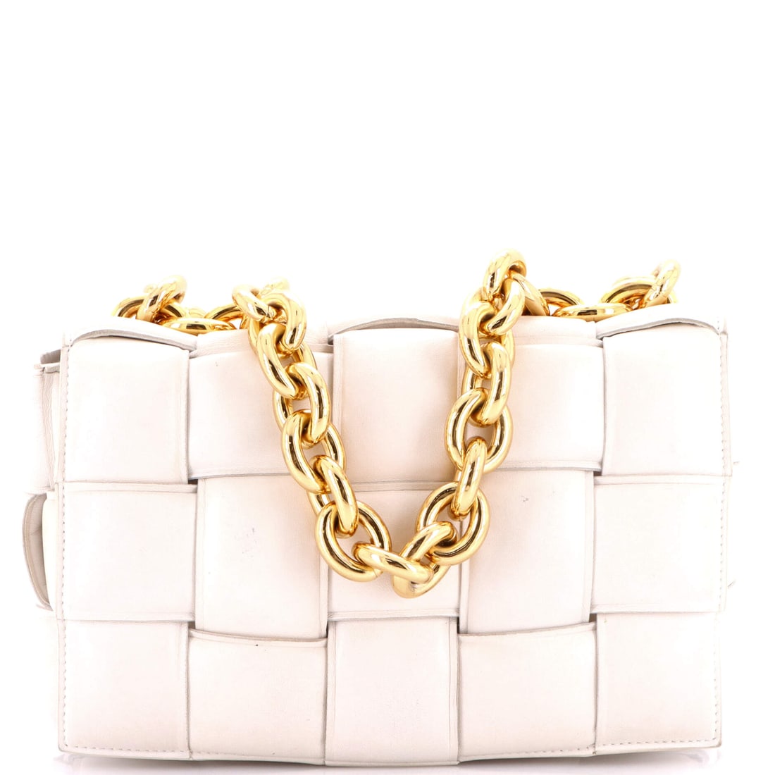 Bottega Veneta Cassette Chain Crossbody Bag Padded Maxi Intrecciato Leather: The Padded maxi intrecciato leather on this Bottega Veneta Cassette Chain Crossbody Bag behaves the way only a house hide can, settling against the frame with the right amount of give. A clean, editor