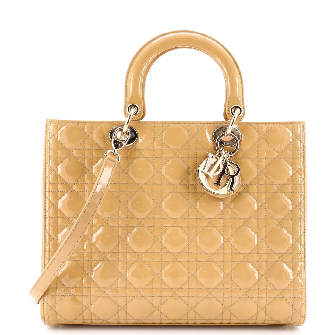 Christian Dior Lady Dior Bag Cannage Quilt Patent Large: Worn, this Christian Dior Lady Dior Bag reads light despite its presence, the kind of carry refinement that defines a working house bag. In neutral, the silhouette reads modern without effort, rendere