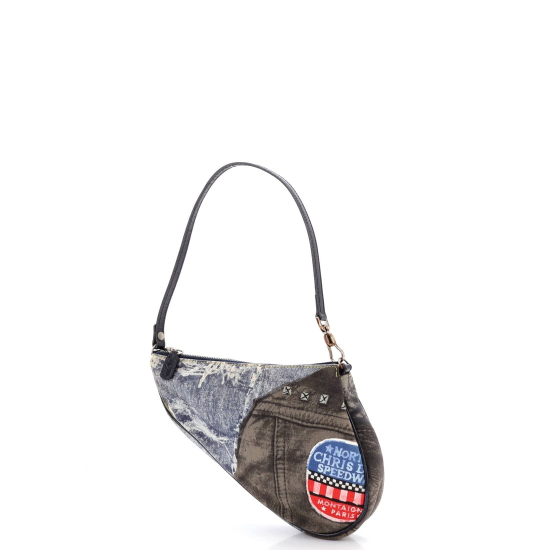 Christian Dior Vintage Saddle Bag Printed Denim Mini: The Christian Dior Vintage Saddle Bag's slip and zip pockets read like a brief from the editor's desk, organized for the realities of a working day. The blue treatment carries its own presence, the ki