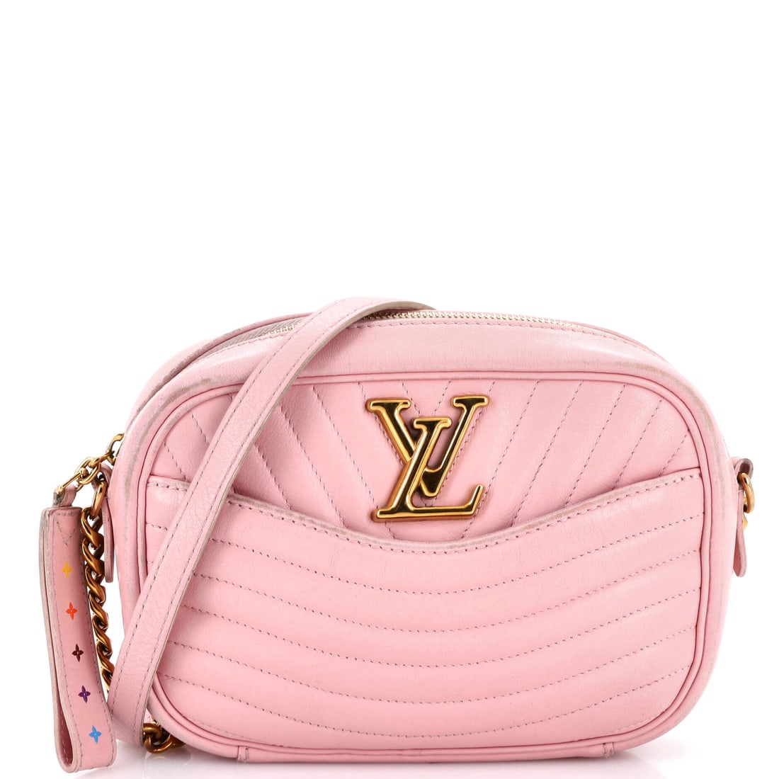 Louis Vuitton New Wave Camera Bag Quilted Leather: Louis Vuitton's New Wave Camera Bag arrives in its working size, the cut that handles the day without flexing the silhouette. A clean, editorial pink pulls the eye first, calibrated to read editorial 