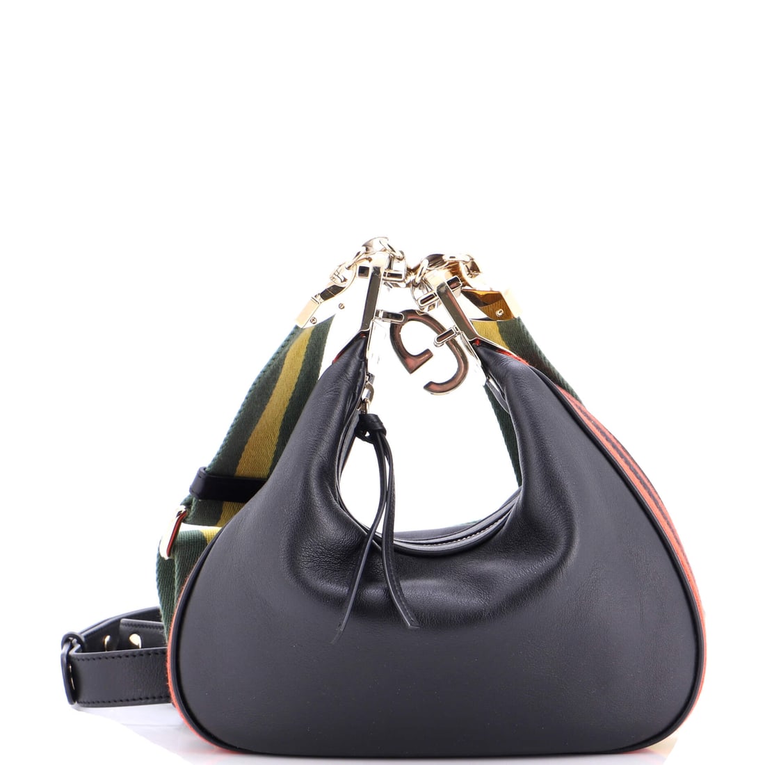 Gucci Attache Shoulder Bag Leather Small: Open the Gucci Attache Shoulder Bag and the interior reads practical first, the kind of layout that quietly justifies the exterior presence. Cast in a saturated black, the kind of palette that earns a