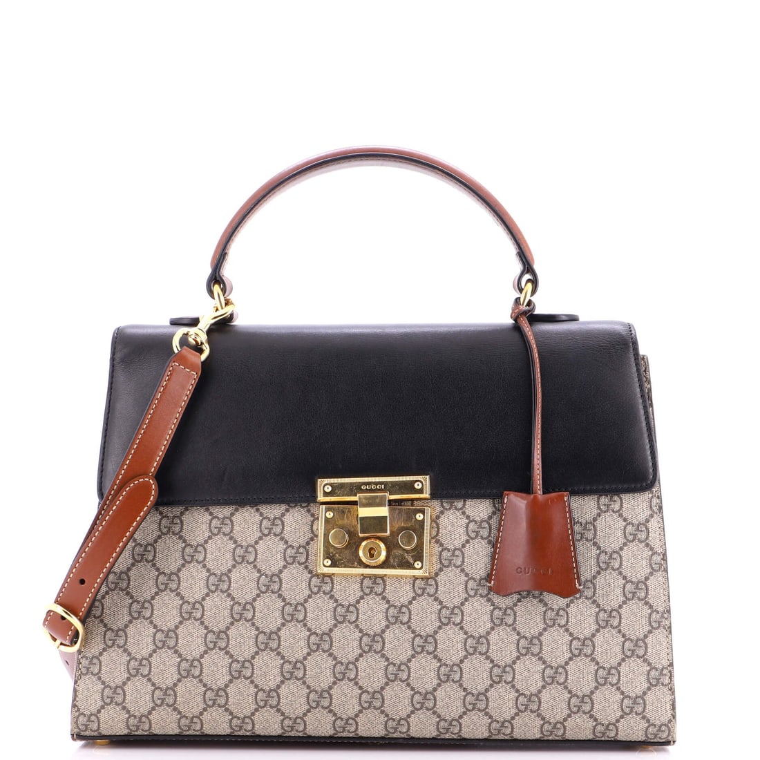 Gucci Padlock Top Handle Bag GG Coated Canvas and Leather Medium: The Gucci Padlock Top Handle Bag rides where it should, an ergonomic geometry that explains why the silhouette has stayed in production. The brown colorway sits richly across the surface, rendered in 