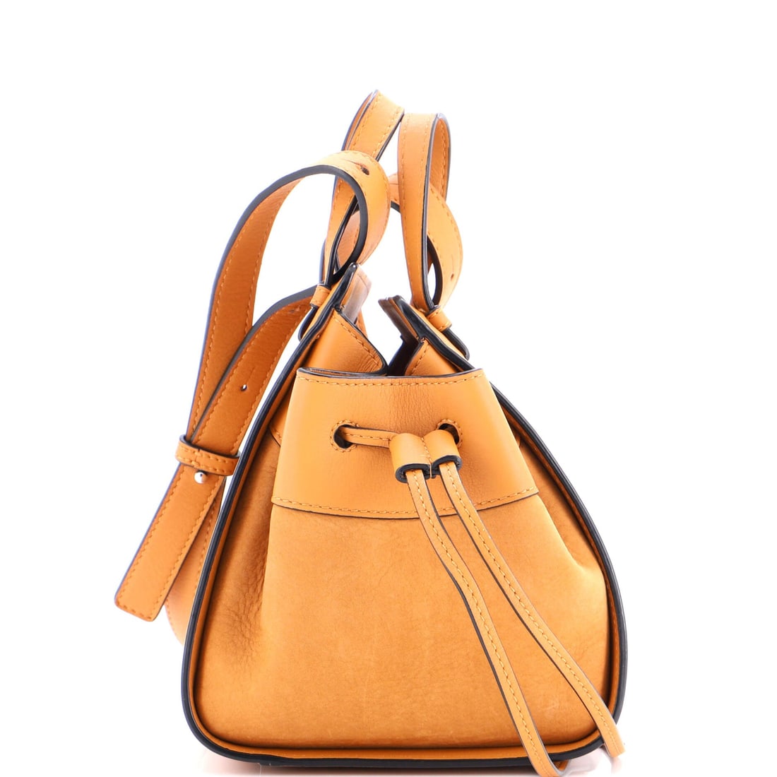 Loewe Hammock Bag Leather and Nubuck Mini: Every pocket on the Loewe Hammock Bag earns its place, the interior laid out for keys, cards, phone and the small accessories of a day. The neutral treatment carries its own presence, the kind of pale