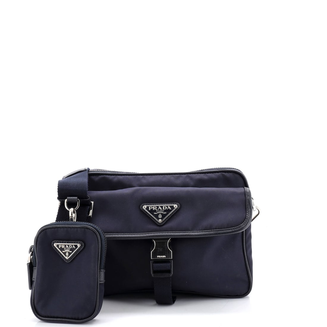 Prada Buckle Front Pocket Flap Messenger Bag Re-Nylon with Saffiano Leather: Within the Prada Buckle Front Pocket Flap Messenger Bag family, this scale strikes a deliberate balance, large enough to read as an everyday carry and compact enough to keep its silhouette. Cast in a 