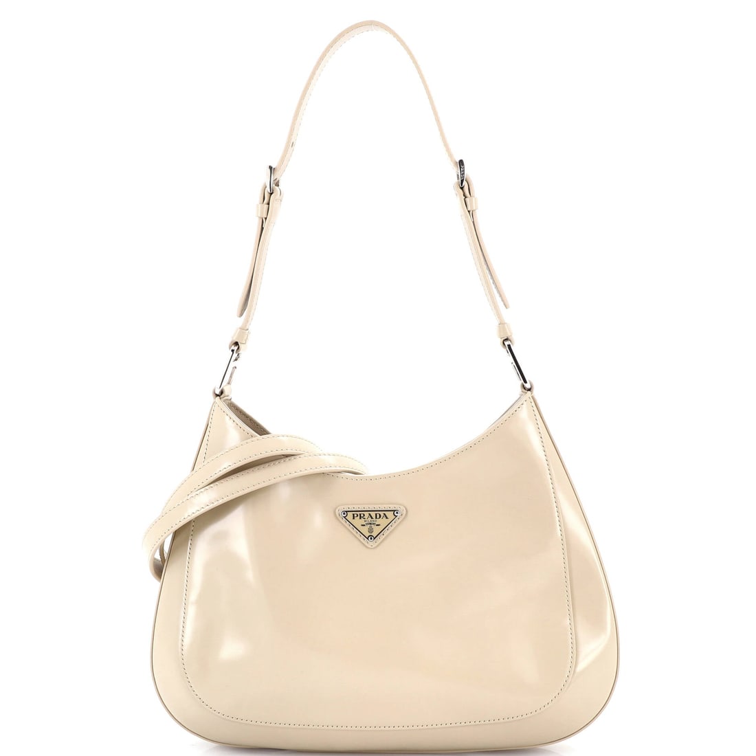 Prada Cleo Shoulder Bag Spazzolato Leather Large: An unmistakable Prada signature on this Cleo Shoulder Bag, the outline drawn with the precision that separates a house bag from a copy. In neutral, the silhouette reads modern without effort, holding 