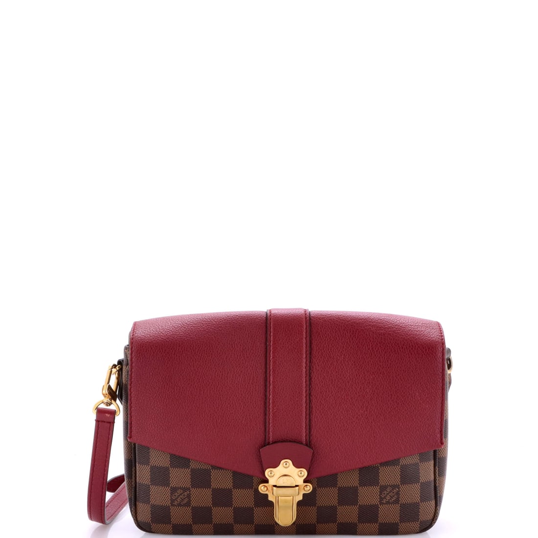 Louis Vuitton Clapton Handbag Damier and Leather PM: The Clapton Handbag's gleaming clasp and fittings carry the Louis Vuitton hardware signature, applied with a working bag's restraint. A luminous brown, red palette carries the read, finished in Damier