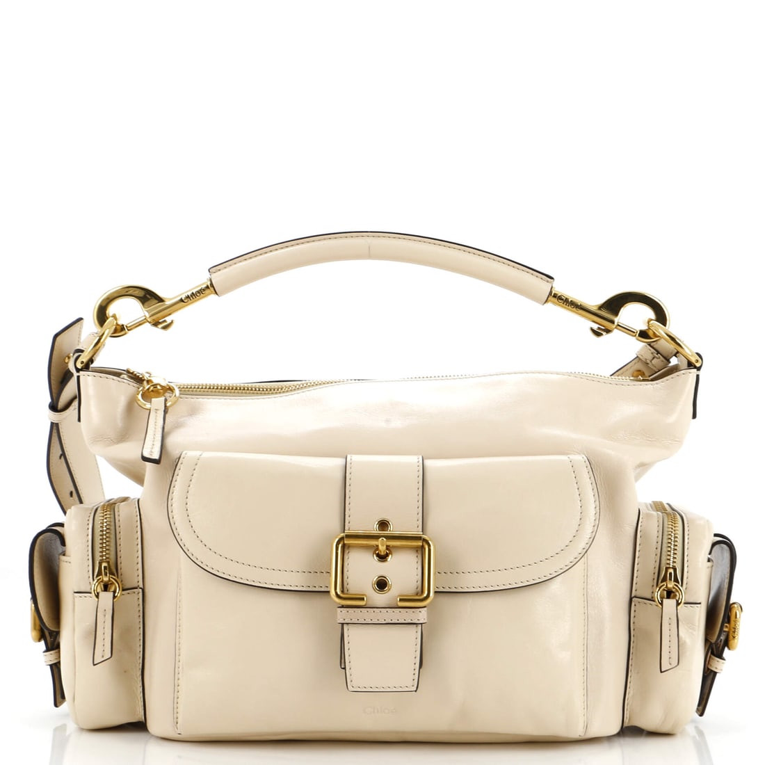 Chloe Camera Shoulder Bag Leather Medium: This Chloe Camera Shoulder Bag sits at the most usable size of its line, a proportion the house returns to season after season. The neutral treatment carries its own presence, calibrated to read edito