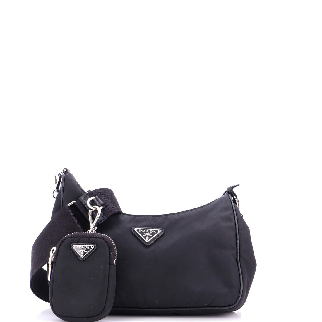 Prada Re-Edition 2005 Shoulder Bag Tessuto Small: Prada's Re-Edition 2005 Shoulder Bag earns its keep inside, the layout reading higher in pocket count than the silhouette suggests. A clean, editorial black pulls the eye first, the kind of palette th