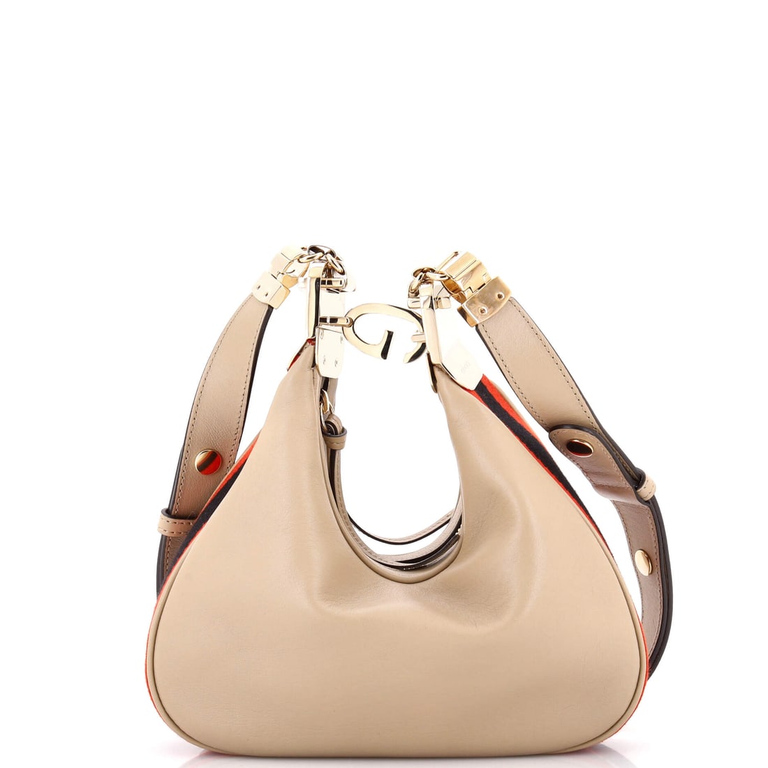 Gucci Attache Shoulder Bag Leather Small: The Gucci Attache Shoulder Bag earns its weight when carried, the kind of bag that disappears into the silhouette rather than fighting it. The black colorway sits richly across the surface, holding th