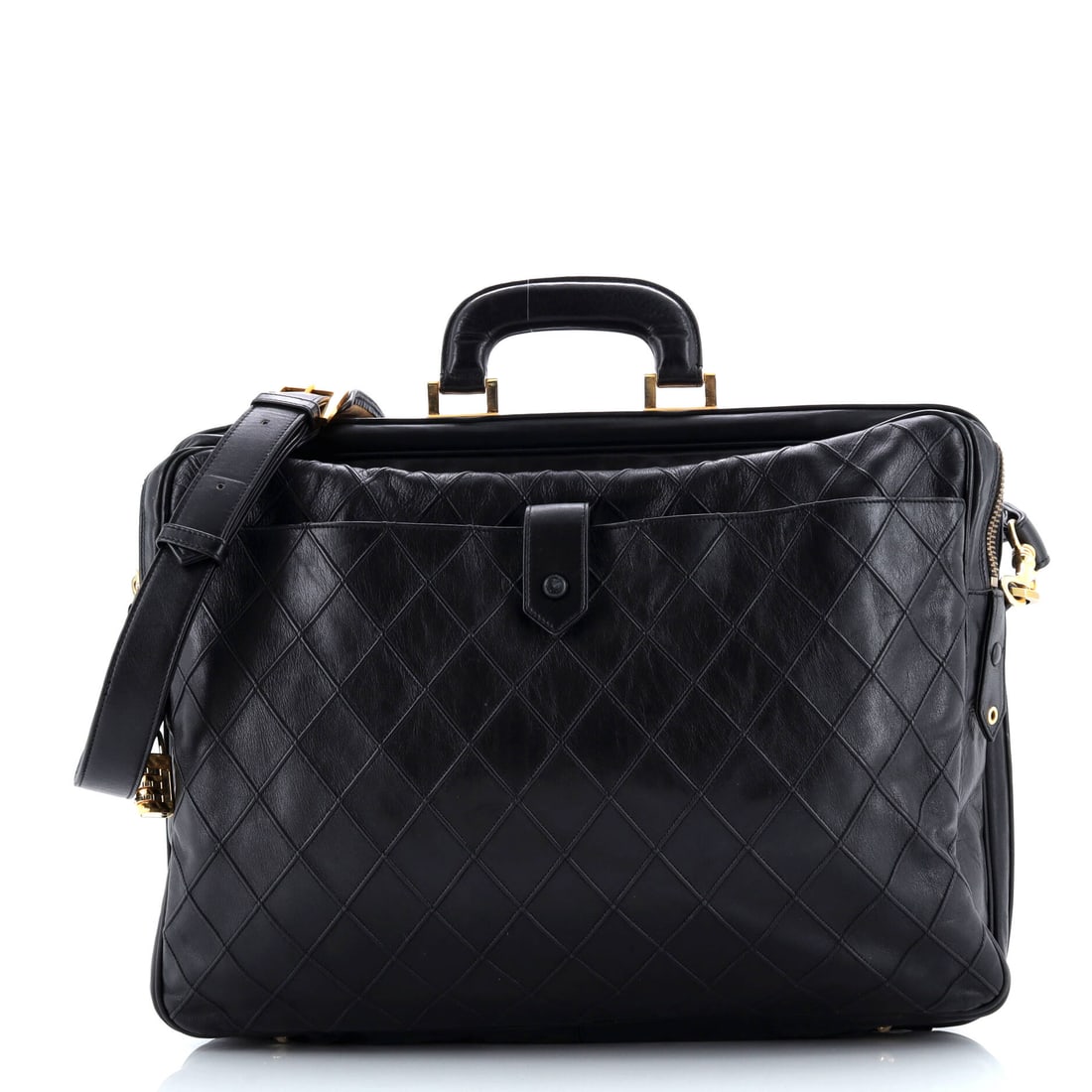 Chanel Vintage Diamond Stitch Weekender Quilted Leather Large: Cut from quilted leather, the Chanel Vintage Diamond Stitch Weekender reads soft to the touch and disciplined on the body. Cast in a saturated black, calibrated to read editorial in any light. With a 