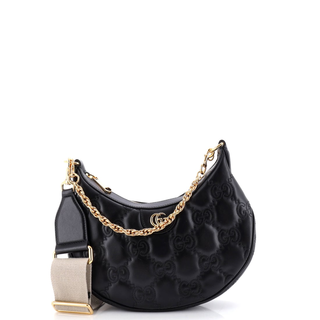 Gucci Half Moon Hobo GG Matelasse Leather Small: Sling the Gucci Half Moon Hobo and it falls into the right spot at the hip, the strap sized to the wearer's natural reach. A luminous black palette carries the read, rendered in matelasse, the quilted