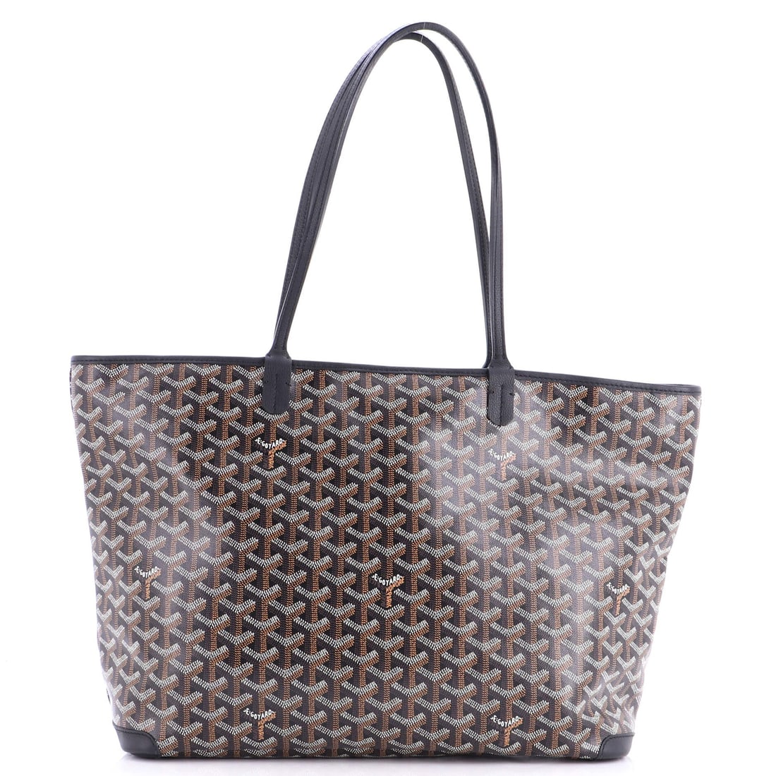 Goyard Artois Tote Coated Canvas GM: At the hardware, the Goyard Artois Tote shows the maison's preference for metalwork that holds its own without crowding the leather. The body reads in the house's coated canvas, a waterproofed jute an