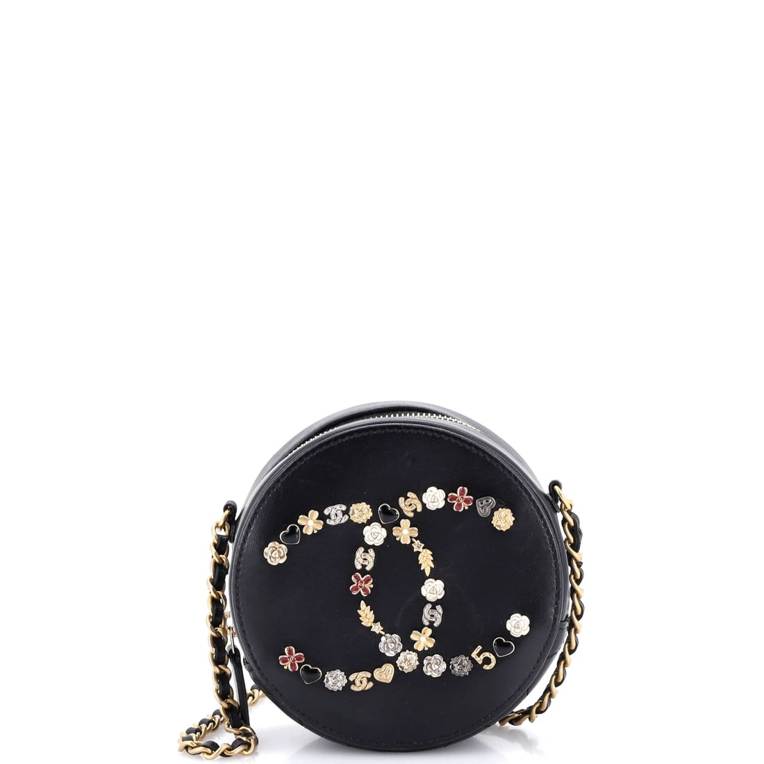 Chanel Lucky Charms Round Clutch With Chain Embellished Lambskin: What carries the Chanel Lucky Charms Round Clutch With Chain most is its material - lambskin, a soft nappa leather prized for its hand - chosen to age into the bag rather than against it. Hardware sit