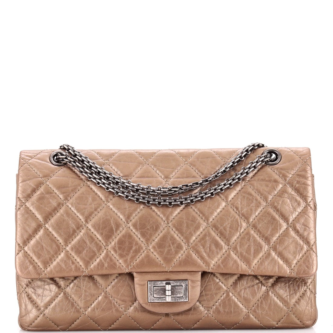 Chanel Reissue 2.55 Flap Bag Quilted Aged Calfskin 226: This Chanel Reissue 2.55 Flap Bag treats its pockets as architecture rather than afterthought, the layout calibrated for the small rituals of leaving the house. Finished in quilted aged calfskin, calf