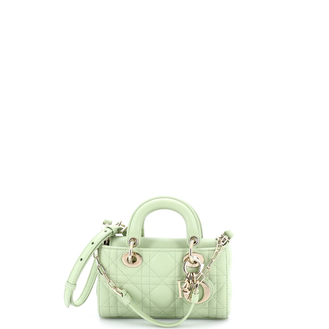 Christian Dior Lady D-Joy Bag Cannage Quilt Lambskin Micro: The Christian Dior Lady D-Joy Bag reads first through its material, the house's cannage quilt, a pattern referencing the Napoleon III chair, here worked in soft lambskin, setting the tone before the e