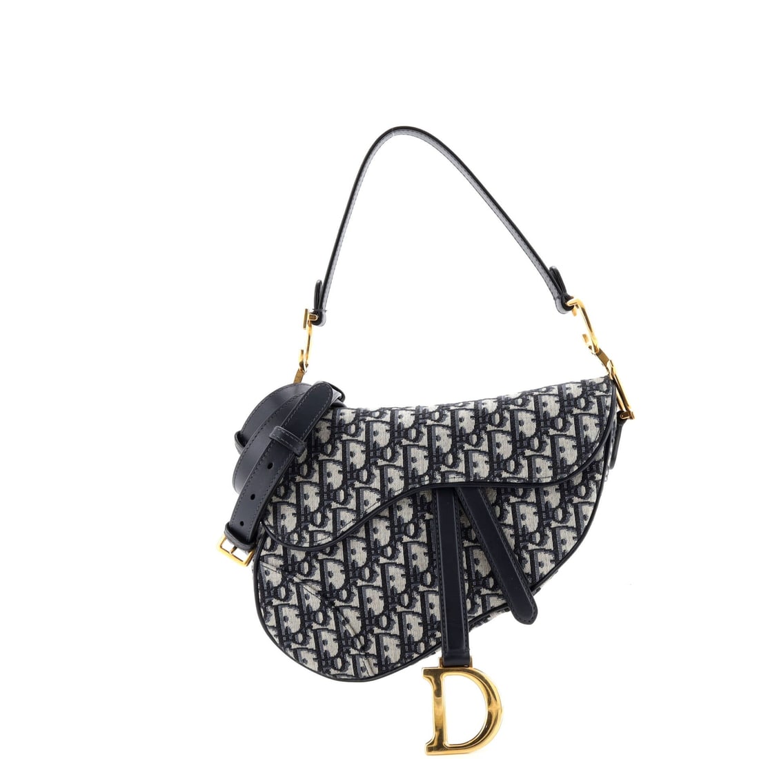 Christian Dior Saddle Handbag with Strap Oblique Canvas Medium: At the Medium scale, the Christian Dior Saddle Handbag with Strap reads as the version most owners end up reaching for first. Finished in Oblique canvas, the Dior monogram coated cotton introduced by 