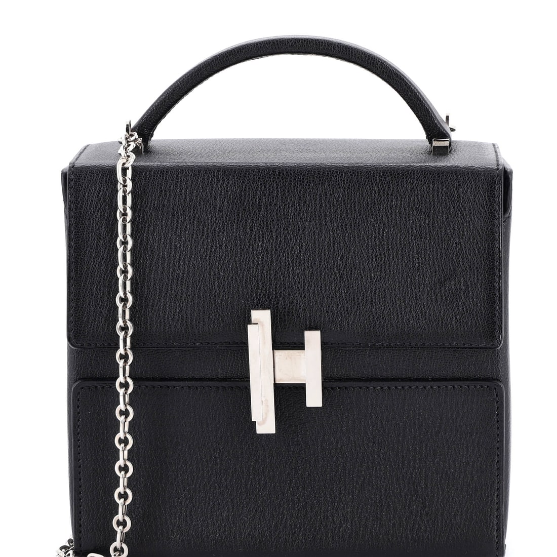 Louis Vuitton Coussin Bag Monogram Embossed Lambskin BB: On the Louis Vuitton Coussin Bag, material does the heavy lifting, with monogram-embossed lambskin, the house initials pressed into soft nappa giving the silhouette its character. Stitching, edges, an