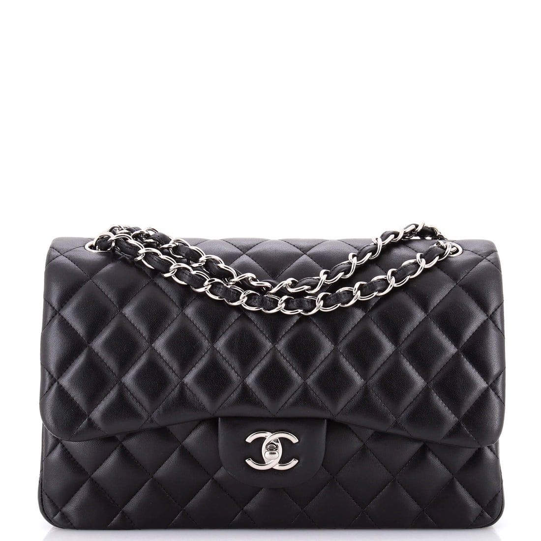 Chanel Filigree Vanity Case Quilted Caviar with Striped Leather Large: Run a finger across the Chanel Filigree Vanity Case and the leather - quilted caviar, Chanel's diamond stitch over pebbled calfskin - reads as the kind of hide the house puts behind its better silhoue