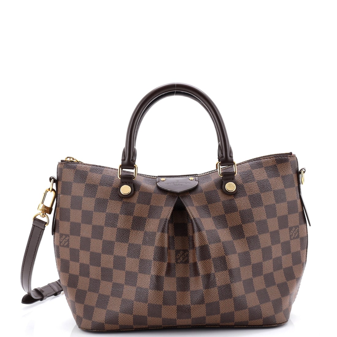 Louis Vuitton Coussin Bag Monogram Embossed Lambskin MM: Inside the Louis Vuitton Coussin Bag, the layout reads as deliberate rather than generous, organized for the small choreography of phone, wallet, keys. Finished in monogram-embossed lambskin, the hous