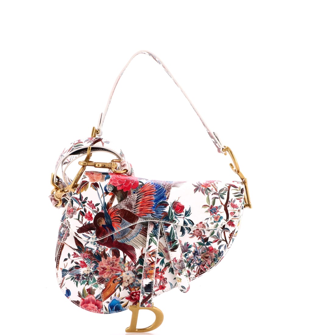 Christian Dior Saddle Handbag with Strap Printed Leather Medium: Sized in Medium, the Christian Dior Saddle Handbag with Strap occupies the sweet spot of the model family, large enough to carry the essentials and small enough to read polished. Finished in printed c