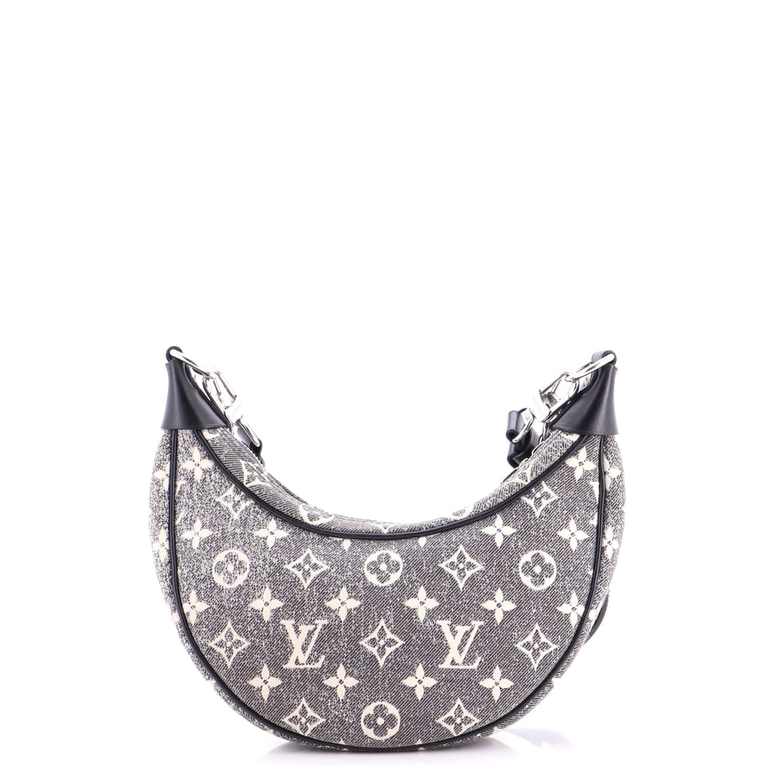 Louis Vuitton Loop Handbag Monogram Jacquard Denim: The Louis Vuitton Loop Handbag reads as the maison's quiet refinement of an already mature silhouette, with the small adjustments the house has banked over the years. Finished in monogram jacquard