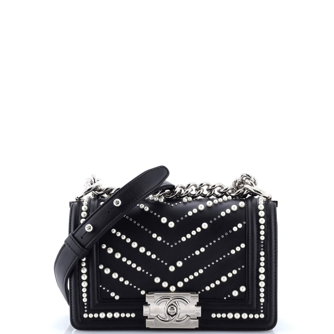 Chanel Boy Flap Bag Pearl Embellished Chevron Calfskin Small: The Small cut of the Chanel Boy Flap Bag is the one buyers tend to actually reach for, scaled to the way real days are spent. The pearl embellished chevron calfskin body reads quietly luxurious,