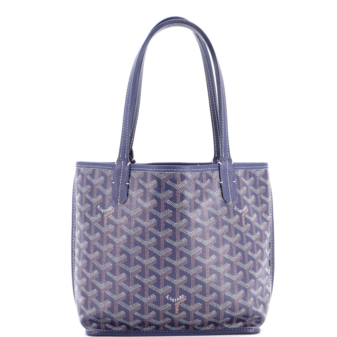 Goyard Anjou Reversible Tote Coated Canvas Mini: As a current chapter in the Anjou Reversible Tote story, this example reads as the considered evolution of a silhouette the maison clearly cares about. The body reads in the house's coated canvas, a
