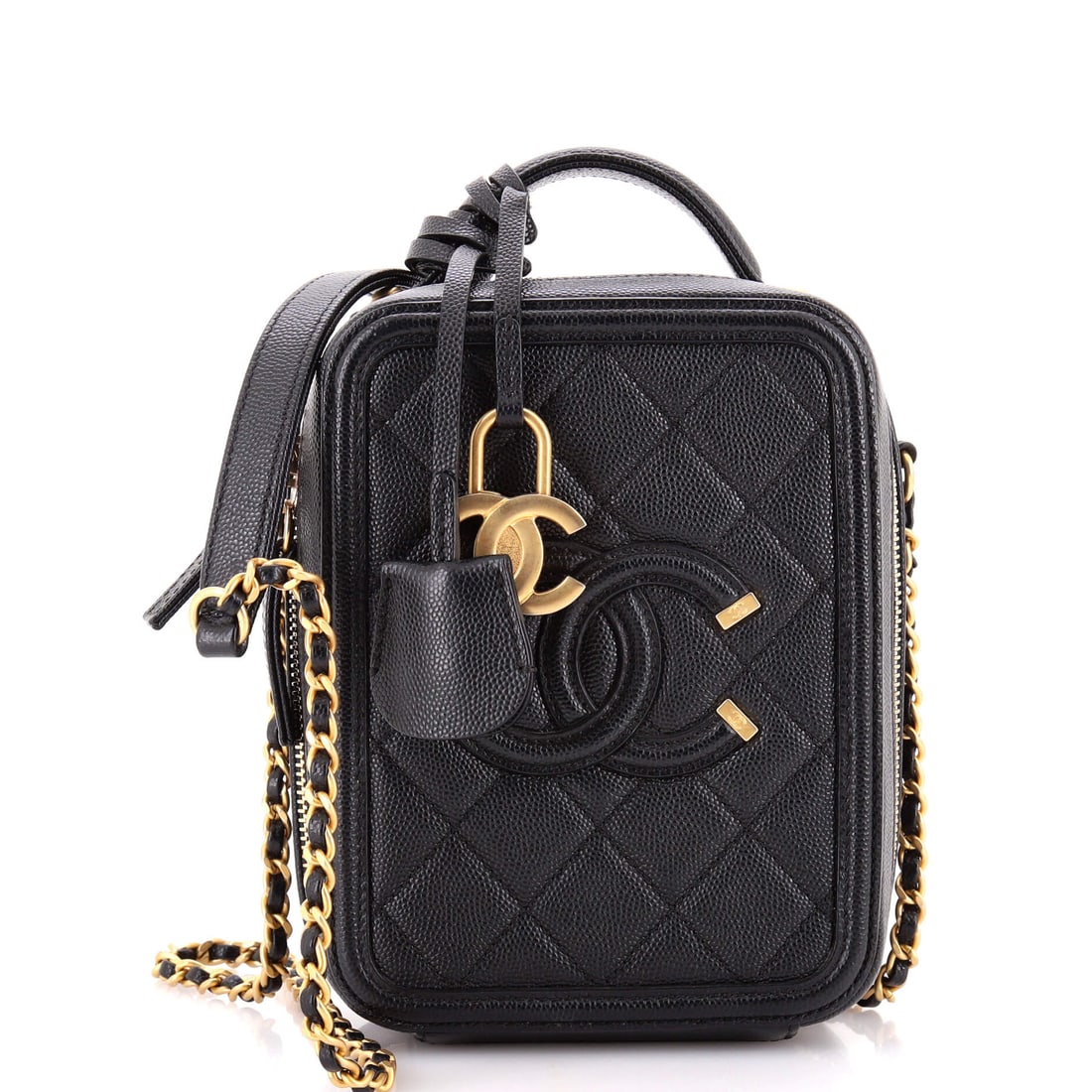 Chanel Filigree Vertical Vanity Case Quilted Caviar: At the hardware, the Chanel Filigree Vertical Vanity Case shows the maison's preference for metalwork that holds its own without crowding the leather. Worked in quilted caviar, Chanel's diamond stitch