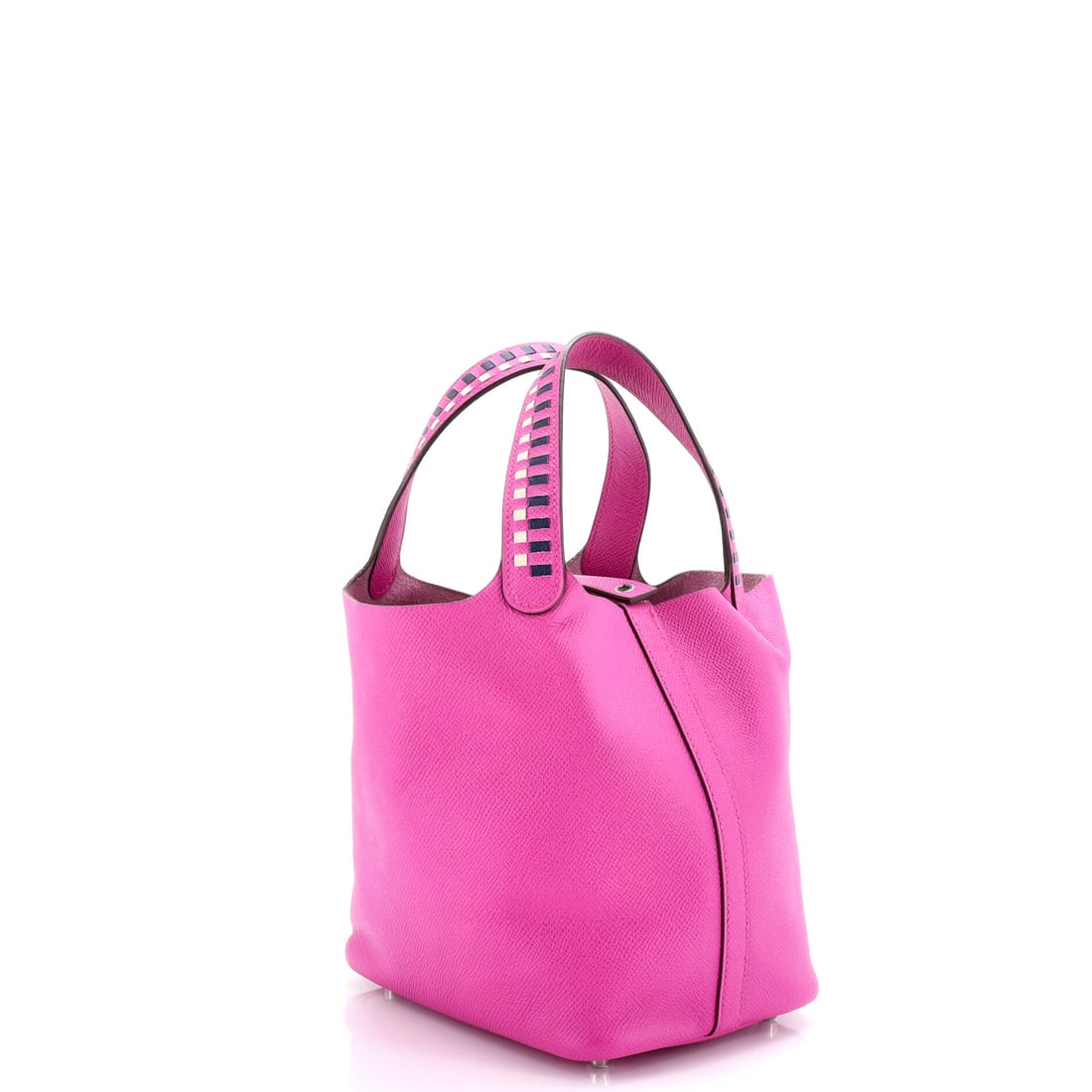Hermes Picotin Lock Bag Tressage Epsom PM: Hardware on the Hermes Picotin Lock Bag sits with the bag rather than on top of it, a small detail that separates considered design from decorative volume. Finished in Tressage Epsom, an interlaced st