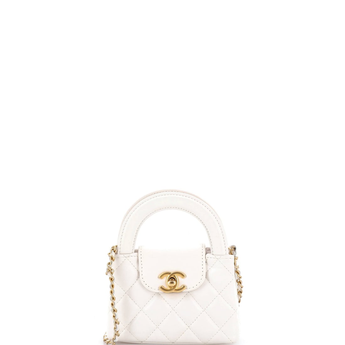 Chanel Kelly Top Handle Shopping Bag Quilted Shiny Aged Calfskin Nano: Compartments inside the Chanel Kelly Top Handle Shopping Bag read as intentional rather than generous, organized for the way modern bags are really used. Finished in quilted shiny aged calfskin, treat
