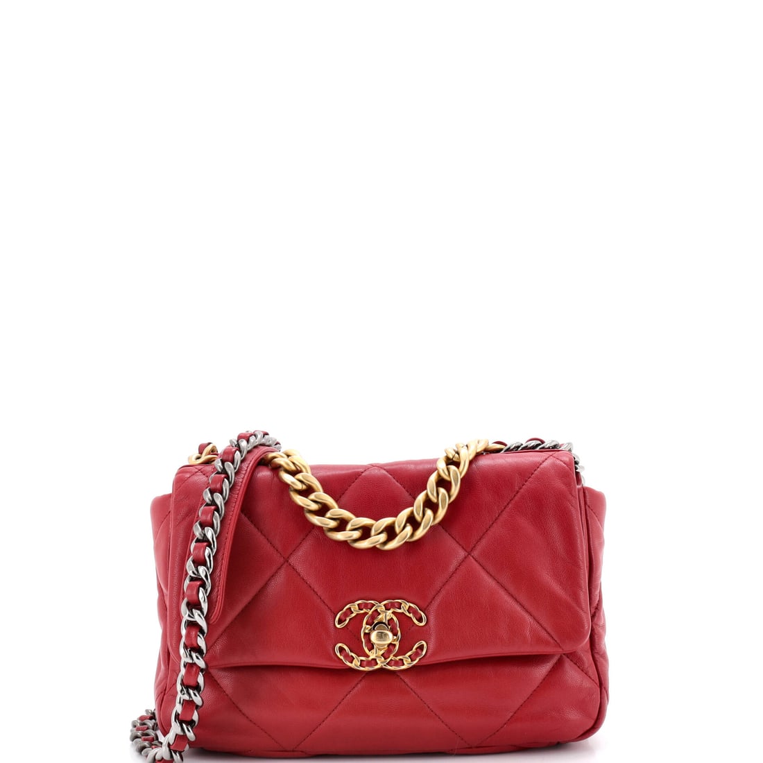 Chanel 19 Flap Bag Quilted Leather Medium: Inside the Chanel 19 Flap Bag, the layout reads as deliberate rather than generous, organized for the small choreography of phone, wallet, keys. Worked in quilted leather, the body carries the depth t