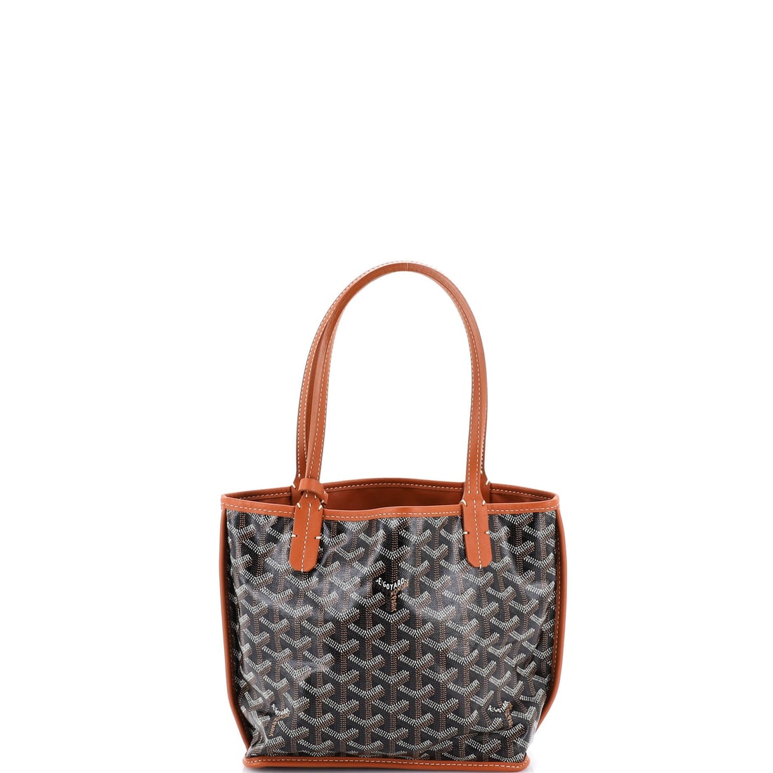 Goyard Anjou Reversible Tote Coated Canvas Mini: Opened up, the Goyard Anjou Reversible Tote reveals an interior tuned for daily use rather than for display, with the house's familiar attention to pocket placement. Worked in the house's coated canva