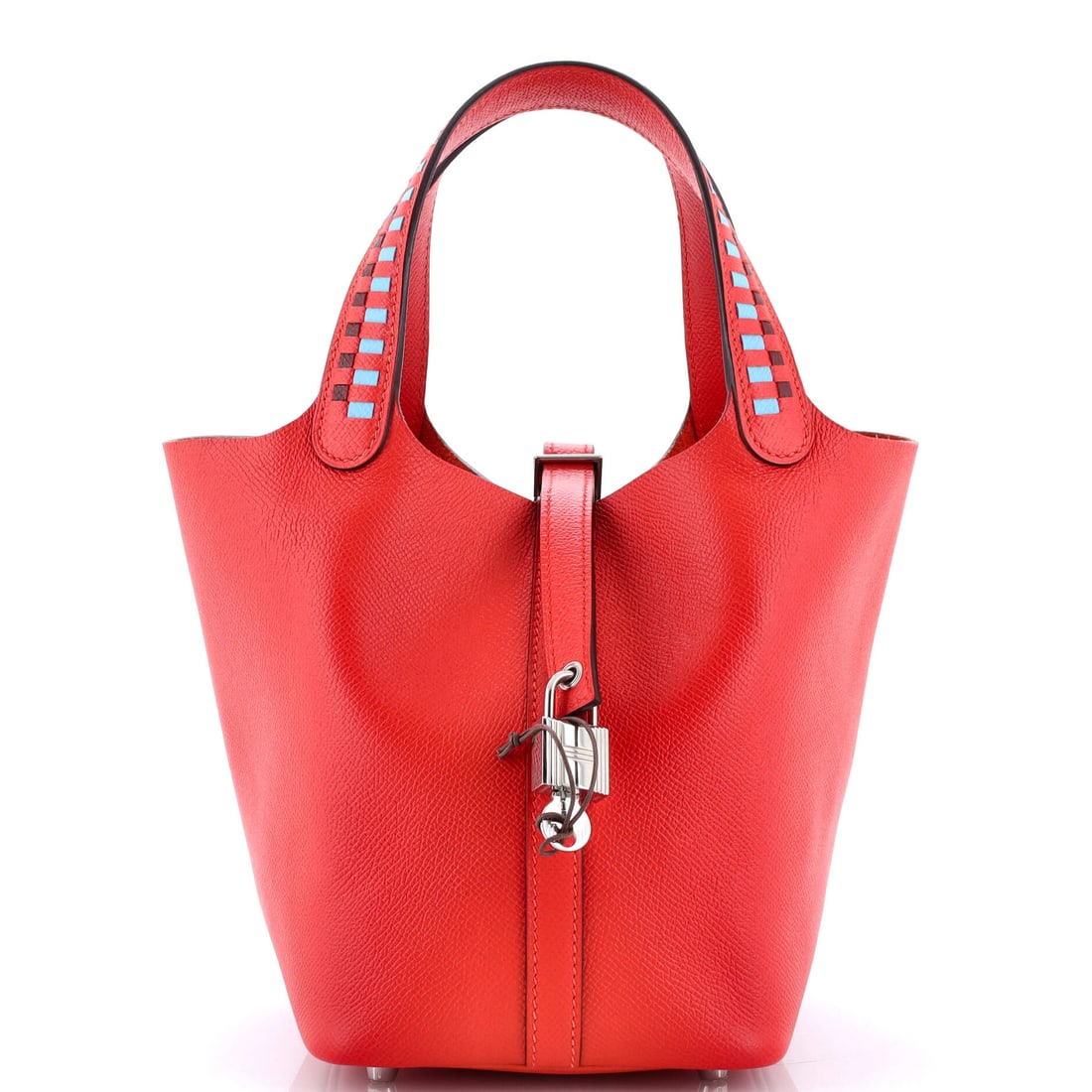 Hermes Picotin Lock Bag Tressage Epsom PM: Pull the Hermes Picotin Lock Bag open and the interior reads as quiet and capable, with pockets placed for the way bags are actually used. The body reads in Tressage Epsom, an interlaced strip of Epso