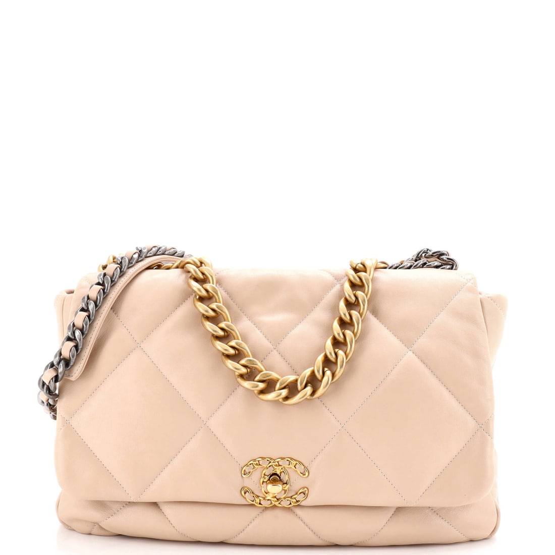 Chanel 19 Flap Bag Quilted Leather Maxi: Cut at Maxi, the Chanel 19 Flap Bag balances presence against portability with the maison's usual judgment. The quilted leather body reads quietly luxurious, settled rather than showy. It is the kind 