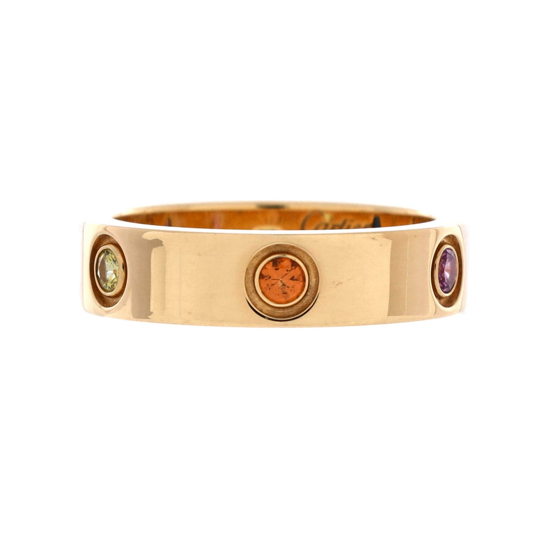 Cartier Love 6 Stone Band Ring 18K Yellow Gold with Sapphires, Garnets and Amethyst Yellow Gold: A Cartier Love Stone Band Ring, crafted in 18K Yellow Gold and set with garnets, amethyst, and sapphires. Cartier's Love motif carries immediate recognition and consistent demand at auction. Bidders