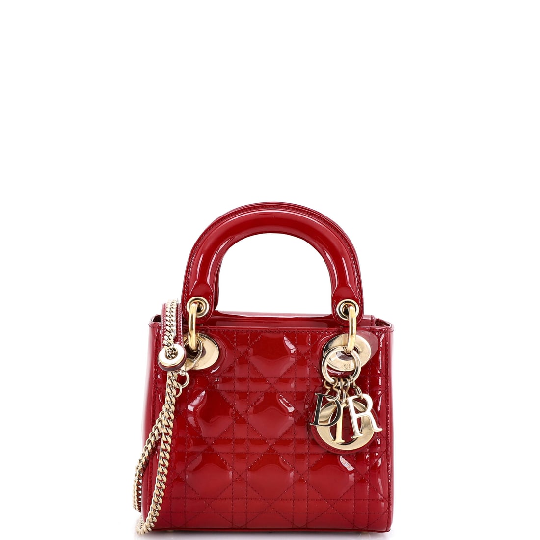 Christian Dior Lady Dior Chain Bag Cannage Quilt Patent Mini Burgundy: Christian Dior's Lady Dior Chain Bag Cannage Quilt in burgundy patent. Offered in the Mini size. Approximate dimensions are 6 x 7 x 3 inches. Structured enough to anchor a wardrobe yet versatile acros
