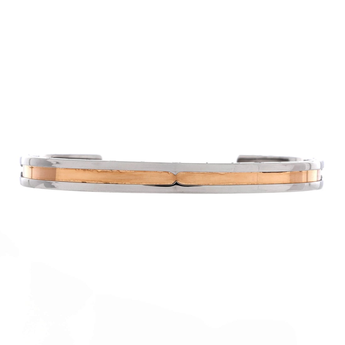 Bvlgari B.Zero1 Cuff Bracelet Stainless Steel and 18K Rose Gold Rose Gold, Silver: The Bvlgari B.Zero1 Cuff Bracelet in Stainless Steel. Bvlgari's B.zero1 architecture is instantly recognizable and a cornerstone of the house's jewelry. Reviewed for authenticity and offered with Mais
