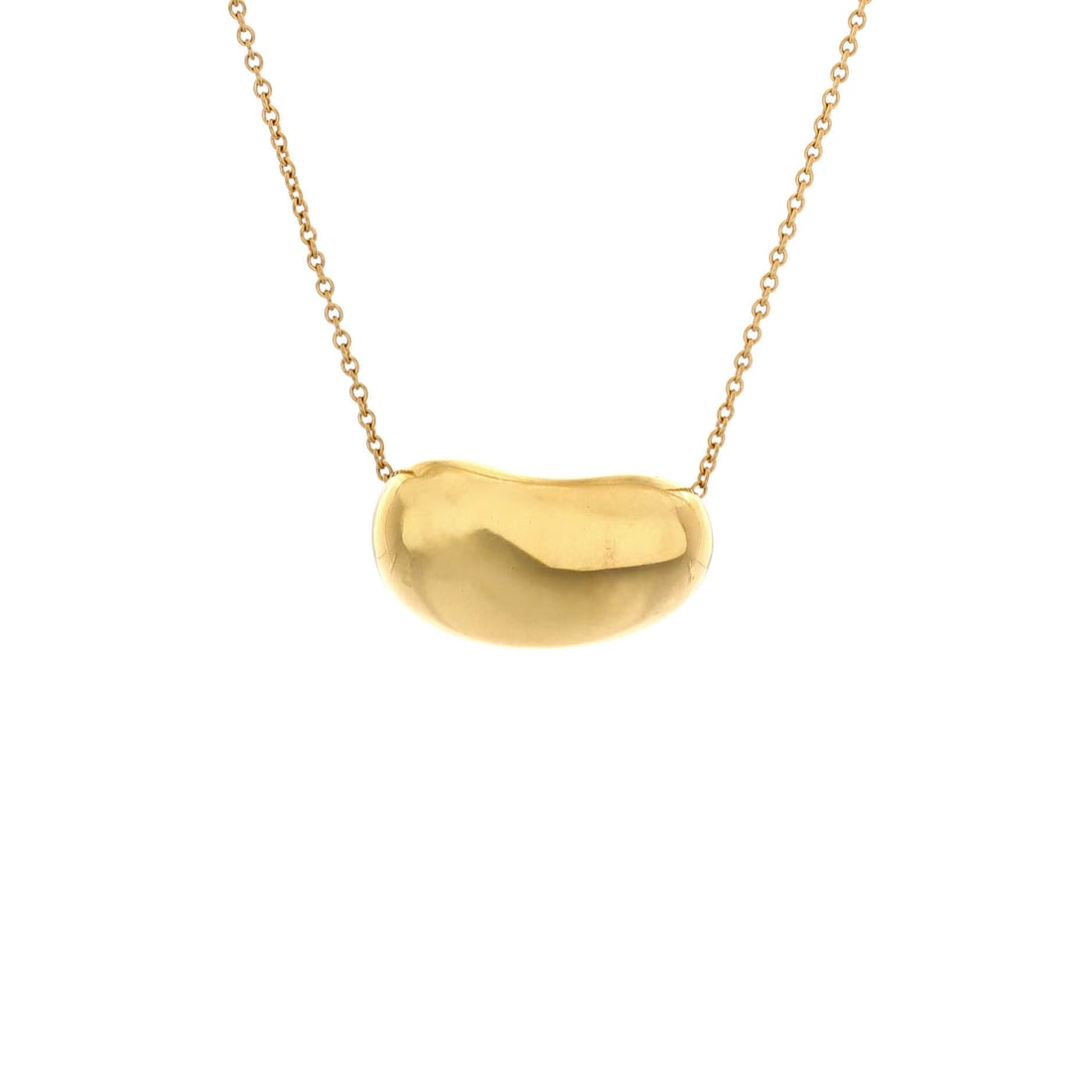 Tiffany & Co. Elsa Peretti Bean Pendant Necklace 18K Yellow Gold 20mm Yellow Gold: Tiffany & Co.'s Elsa Peretti Bean Pendant Necklace, worked in 18K Yellow Gold. The 18K Yellow Gold construction gives the design weight and a polished finish. The piece offers clear designer identity 